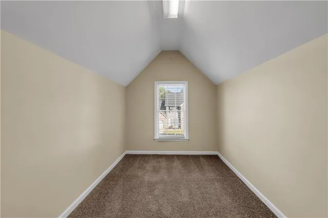 a view of a window in an empty room