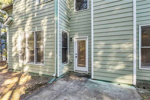 a view of a house with a door and a window