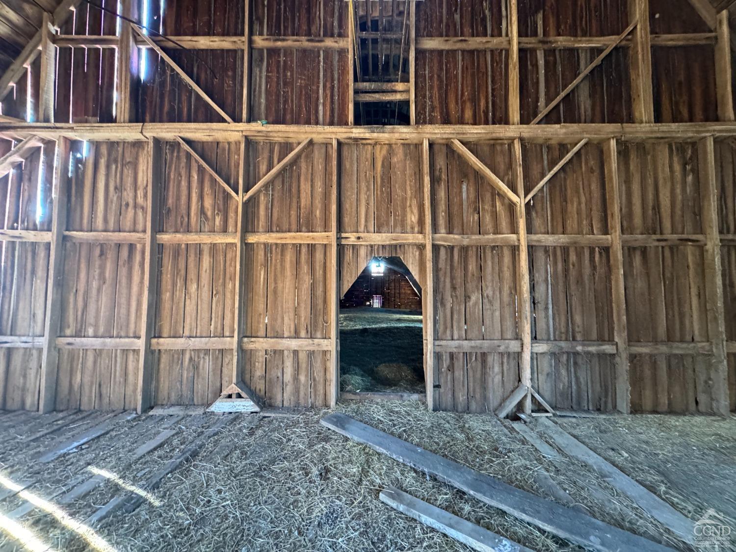 14 Downing Road Ghent, NY 12075 - Photo 10 of 13 a view of a house with a wooden deck
