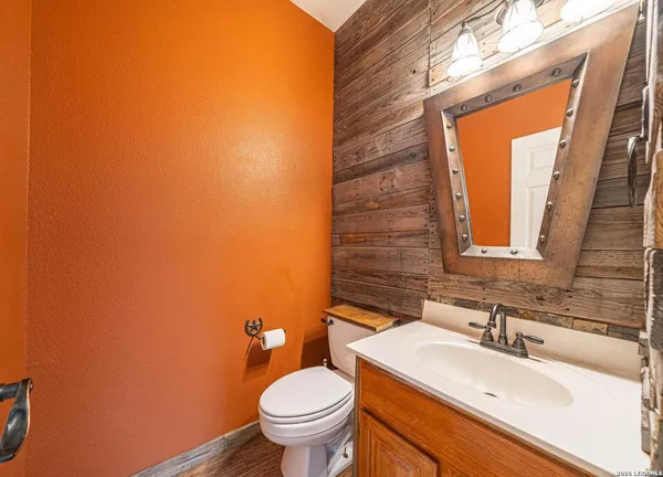a bathroom with a sink and a toilet