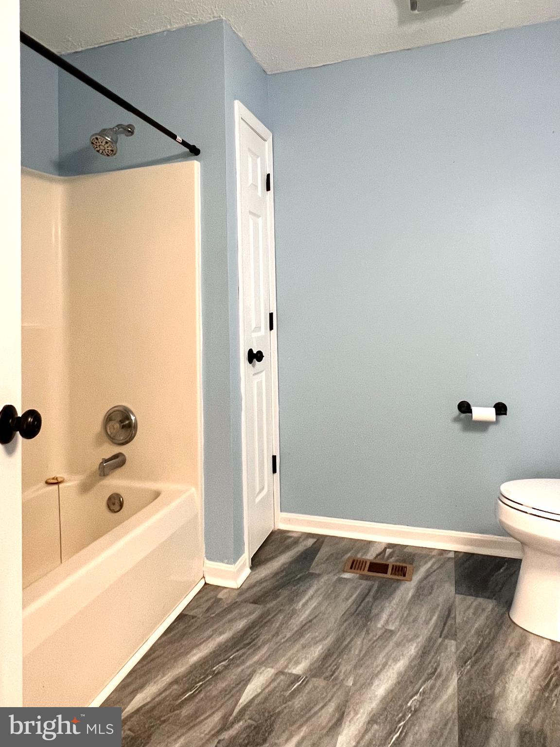 179 Robelei Drive Ranson, WV 25438 - Photo 14 of 17 a bathroom with a bathtub and a shower