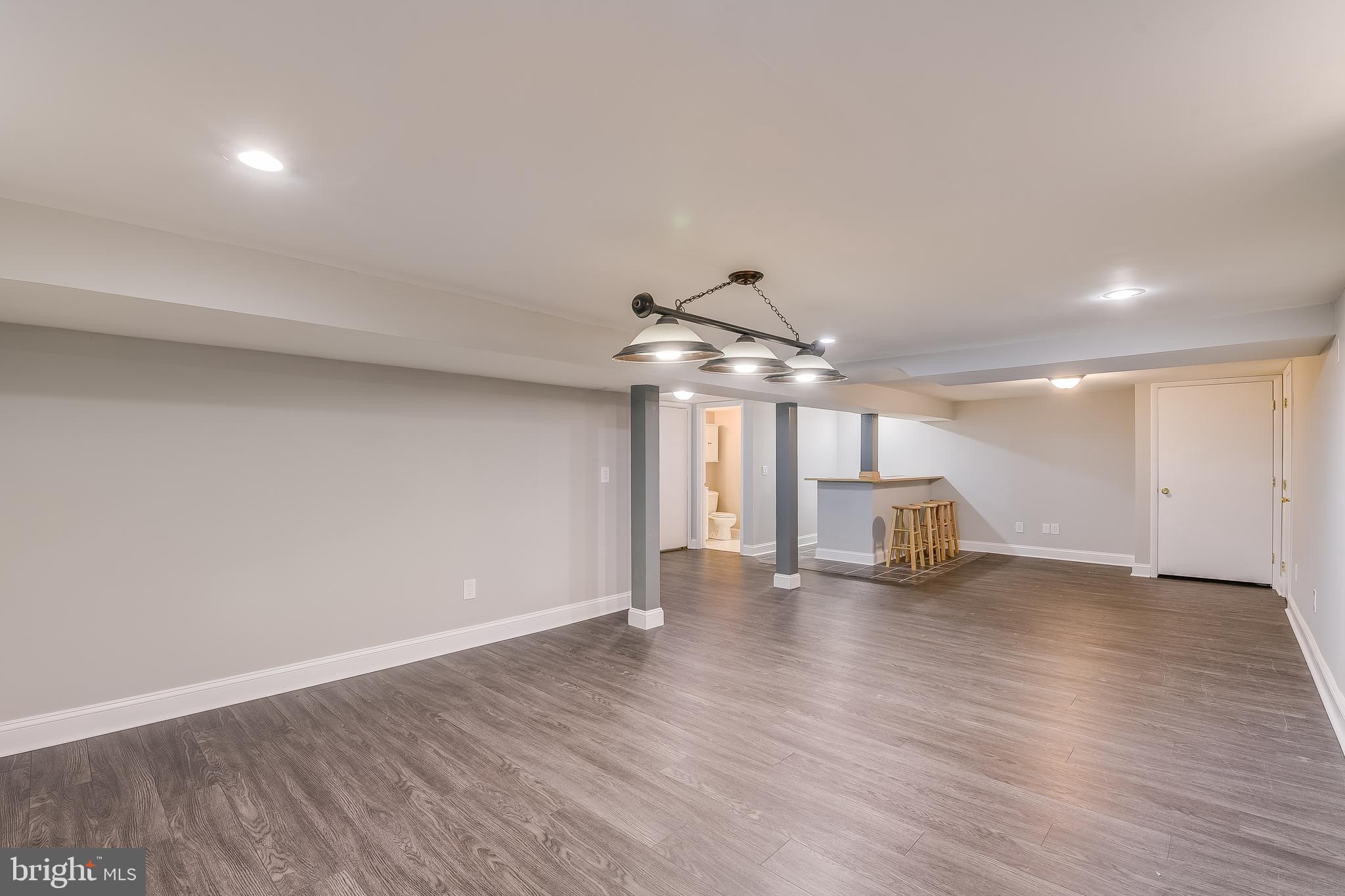 8408 Maryland Road Pasadena, MD 21122 - Photo 37 of 47 Lower Level Finished Basement Family Room with We