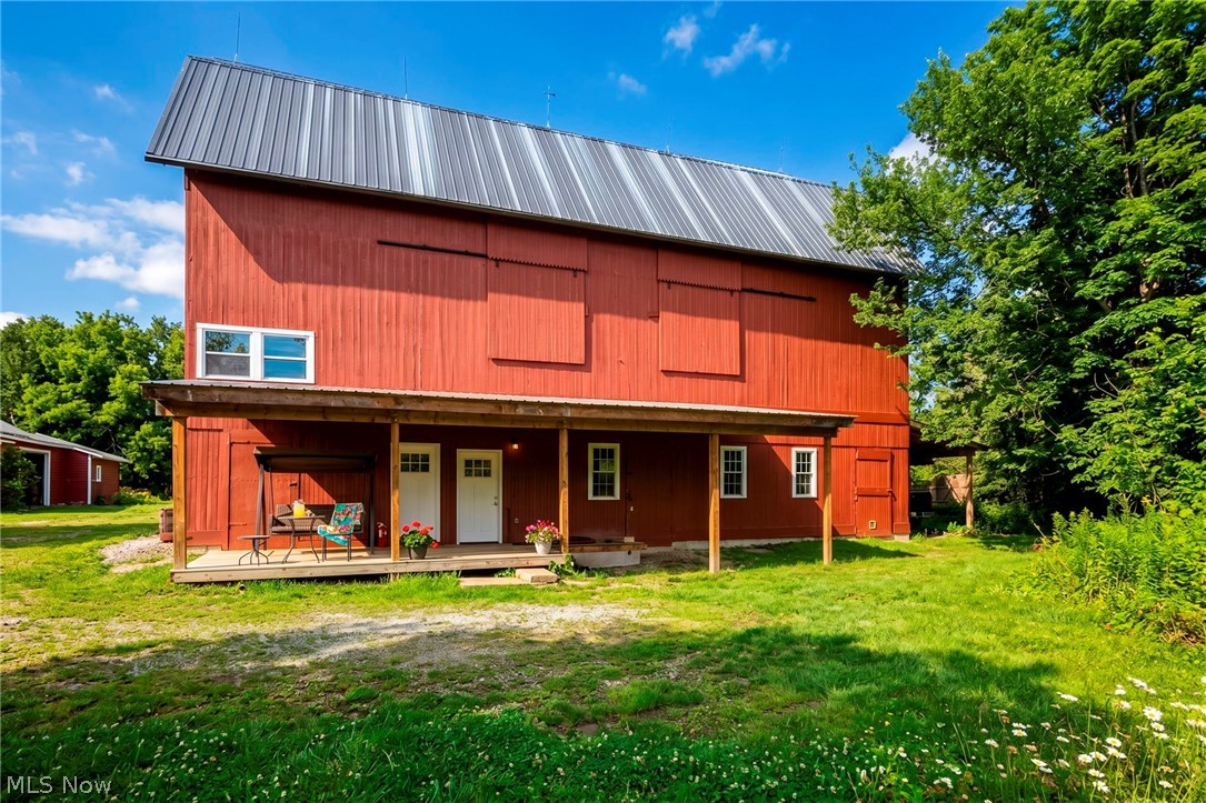Deck off the back of the barn overlooking the scenic acreage.