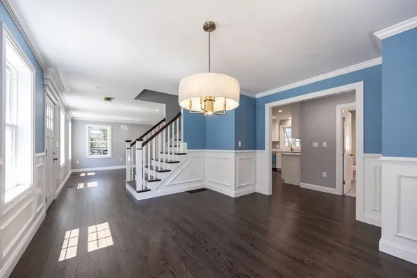 a view of entryway with wooden floor