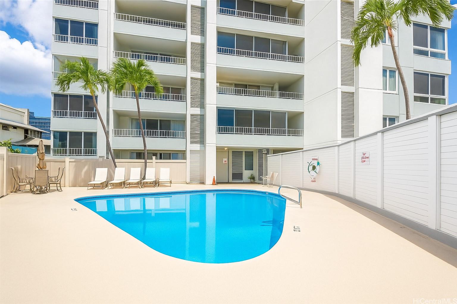 1400 Pensacola Street, Unit 903 Honolulu, HI 96822 - Photo 3 of 14 a view of a swimming pool with outdoor space