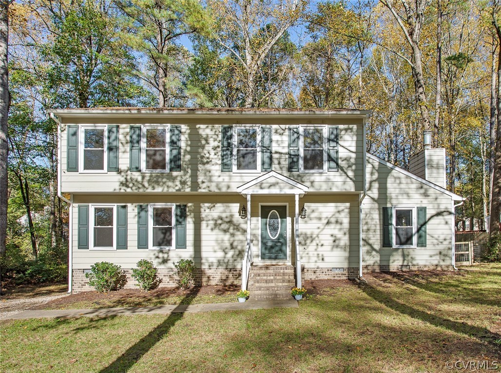 front view of house with a yard