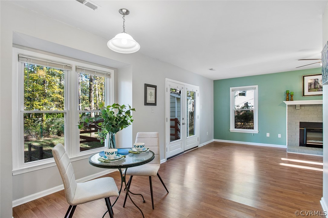 4501 Rabbit Foot Lane North Chesterfield, VA 23236 - Photo 10 of 32 a view of a dining room with furniture window and wooden floor