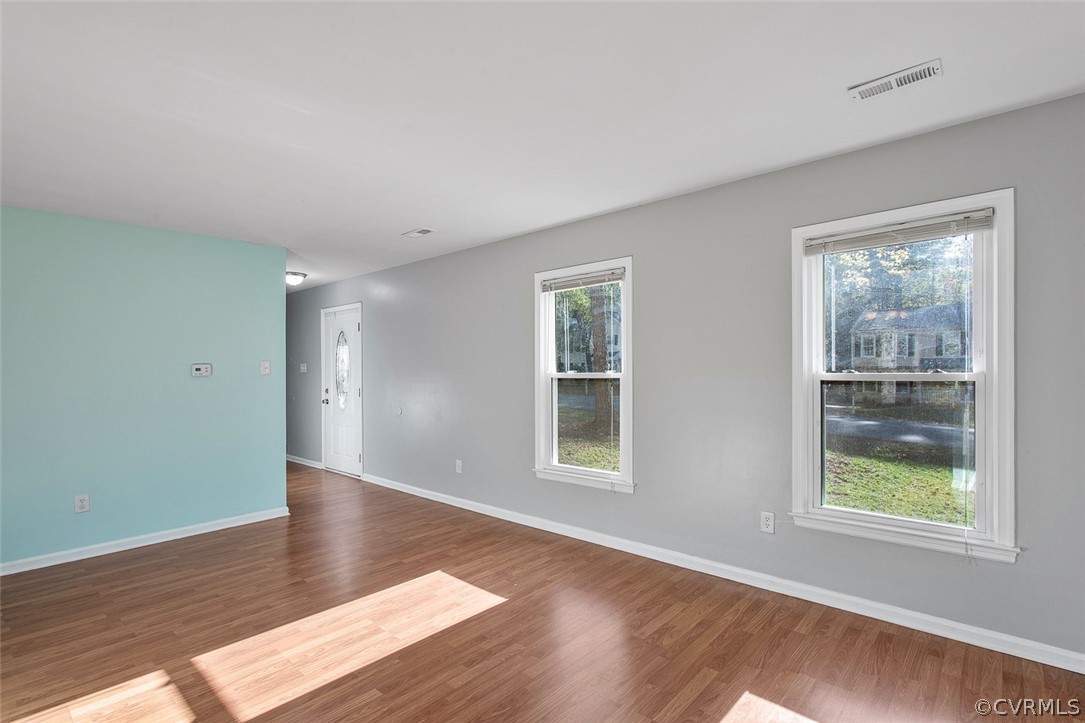 4501 Rabbit Foot Lane North Chesterfield, VA 23236 - Photo 14 of 32 an empty room with wooden floor and windows