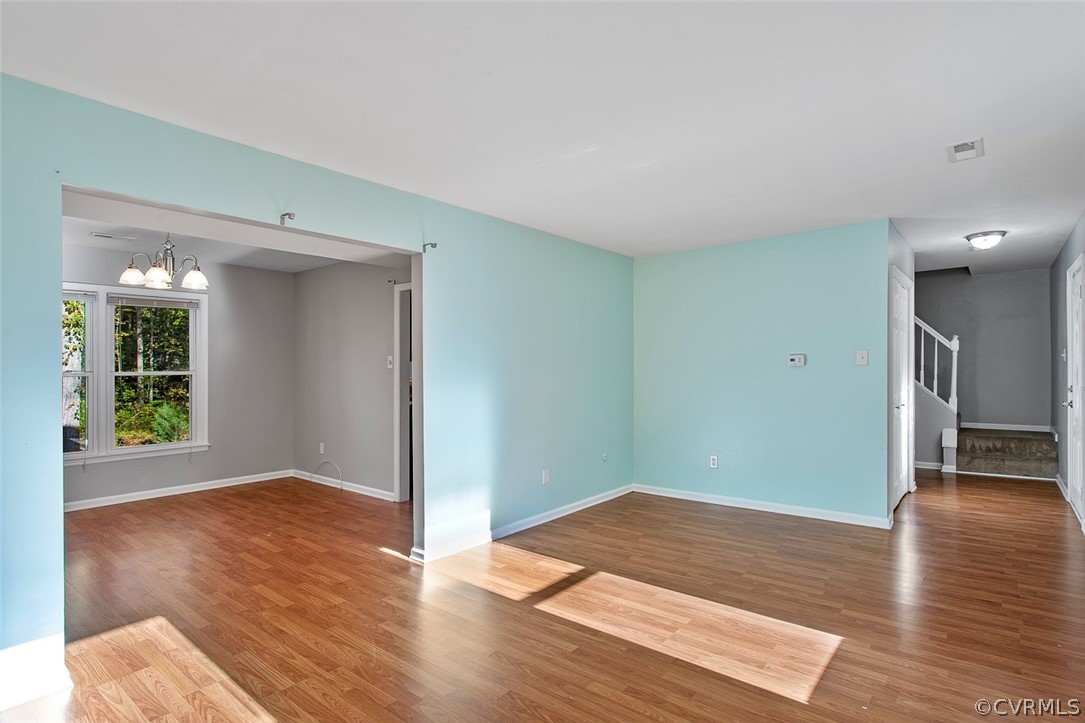 4501 Rabbit Foot Lane North Chesterfield, VA 23236 - Photo 15 of 32 wooden floor in an empty room with a window