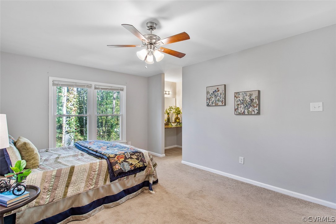 4501 Rabbit Foot Lane North Chesterfield, VA 23236 - Photo 18 of 32 a bedroom with a bed and painting on the wall