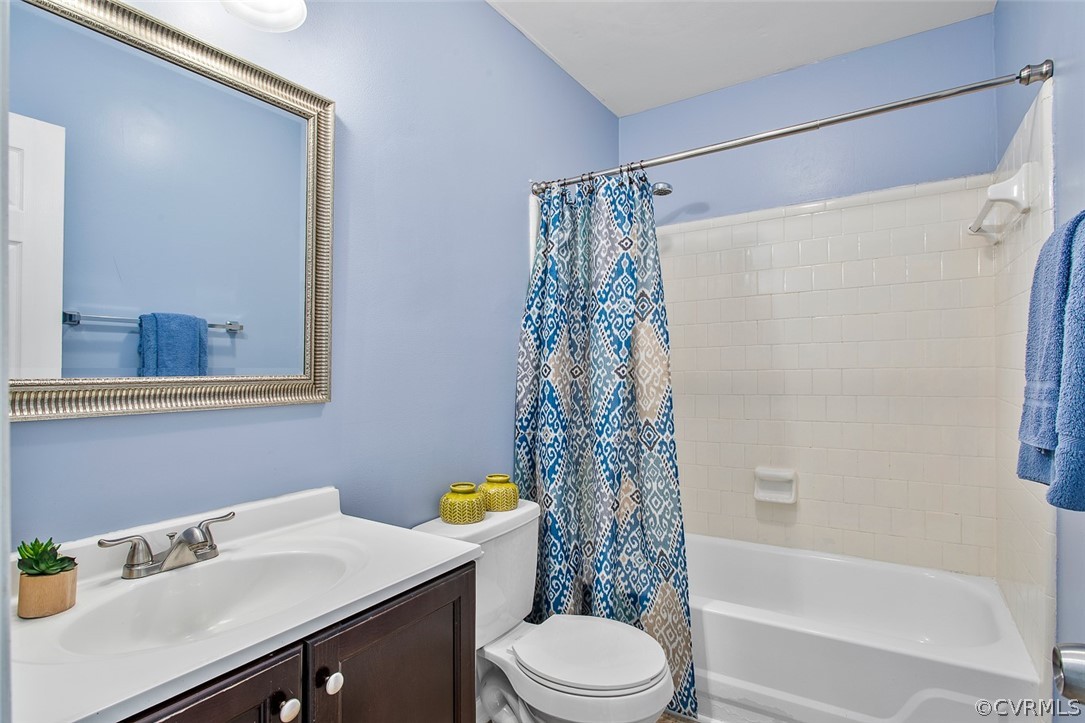 4501 Rabbit Foot Lane North Chesterfield, VA 23236 - Photo 25 of 32 a bathroom with a sink a toilet and shower