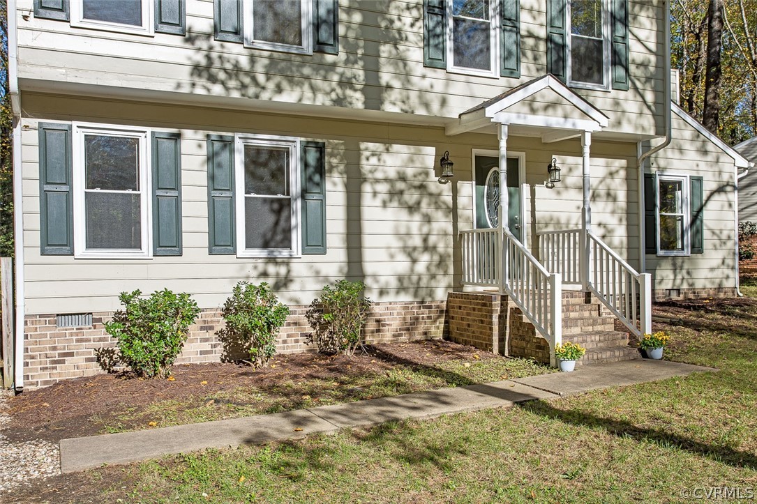 4501 Rabbit Foot Lane North Chesterfield, VA 23236 - Photo 3 of 32 a front view of a house with a porch