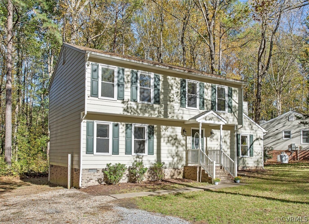 4501 Rabbit Foot Lane North Chesterfield, VA 23236 - Photo 31 of 32 front view of a house with a yard