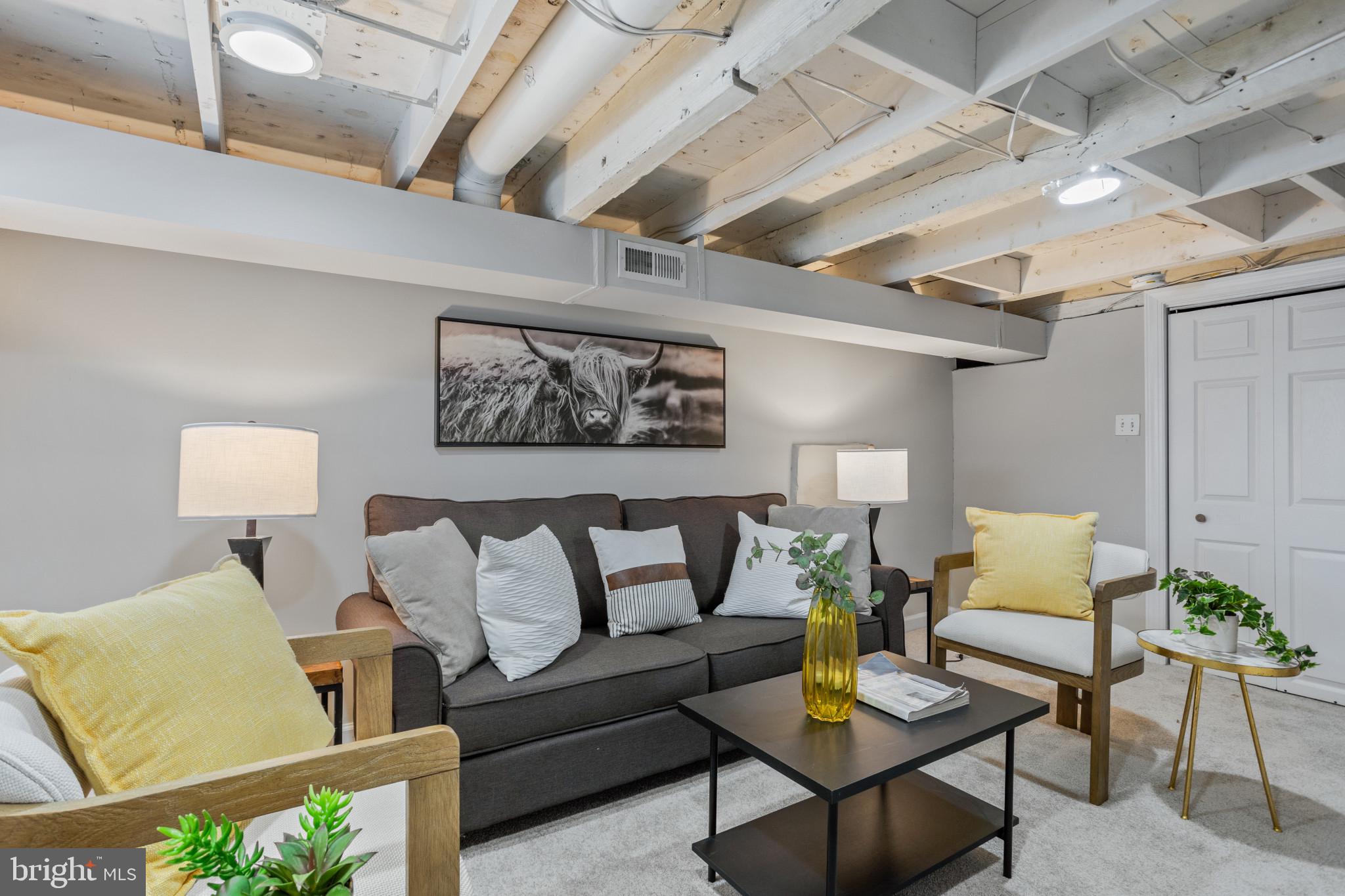 1432 Andre Street Baltimore, MD 21230 - Photo 19 of 25 a living room with furniture and a lamp