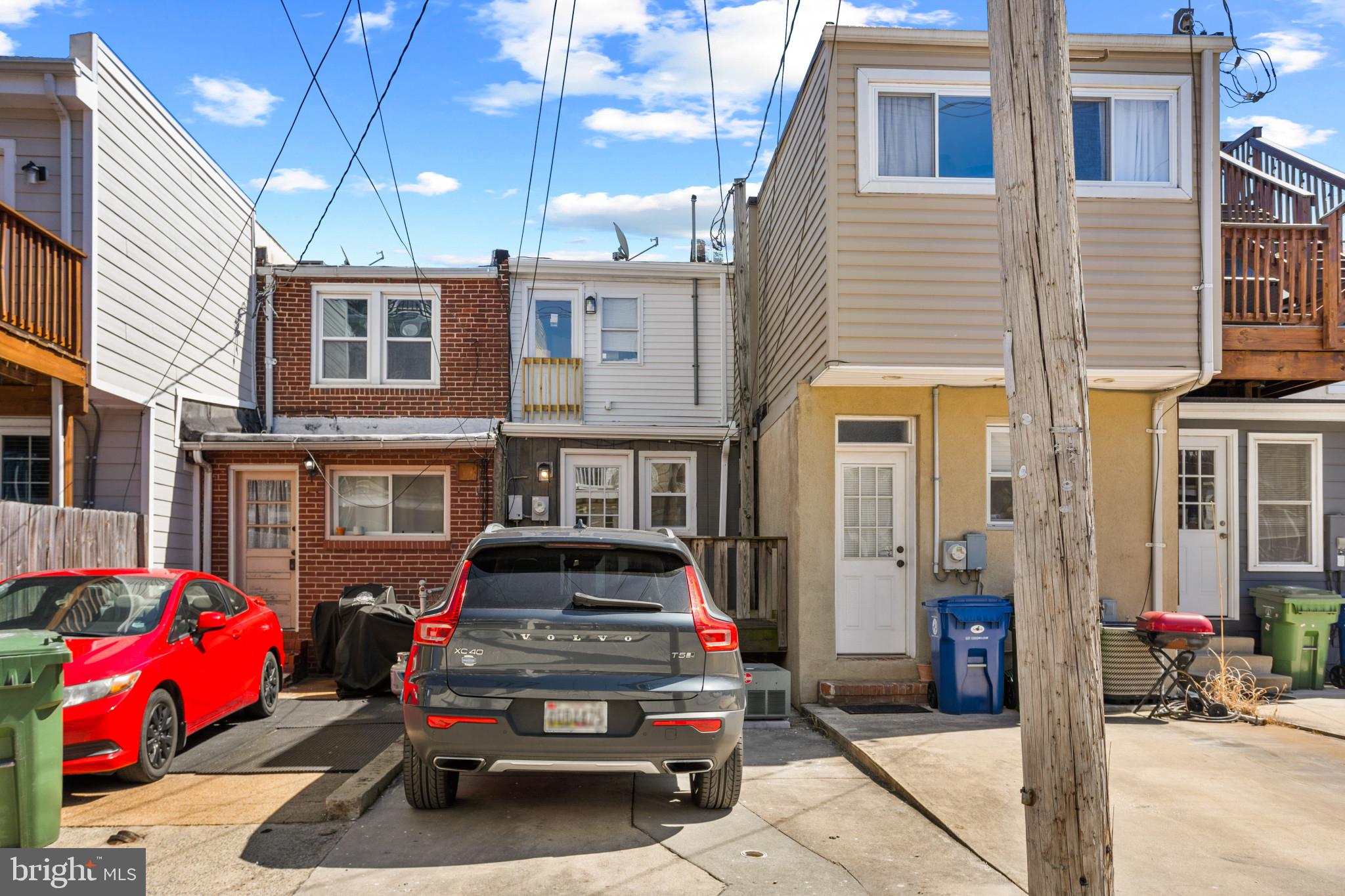 1432 Andre Street Baltimore, MD 21230 - Photo 23 of 25 a car parked in front of a building
