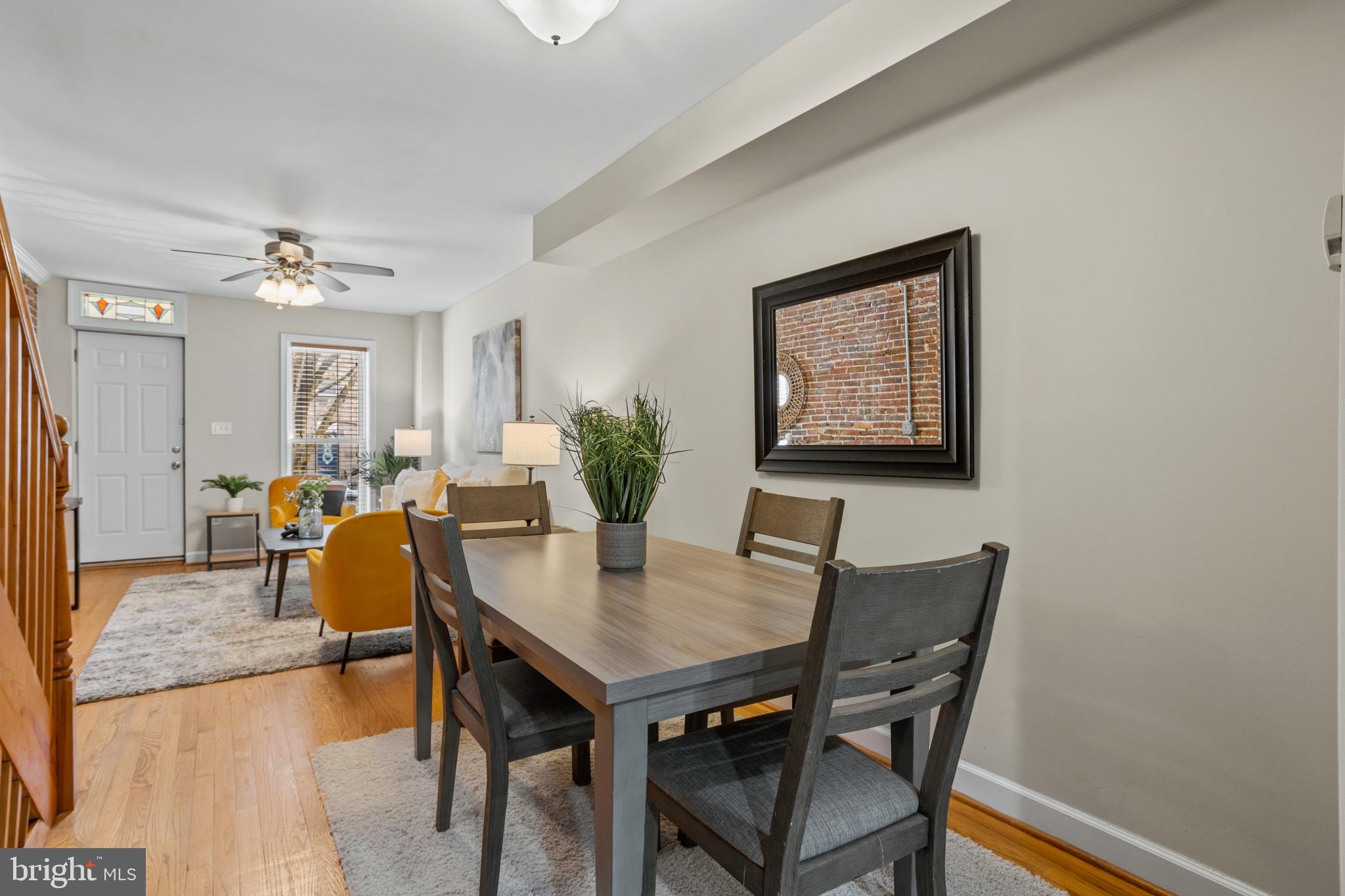 1432 Andre Street Baltimore, MD 21230 - Photo 5 of 25 a view of a dining room with furniture and wooden floor