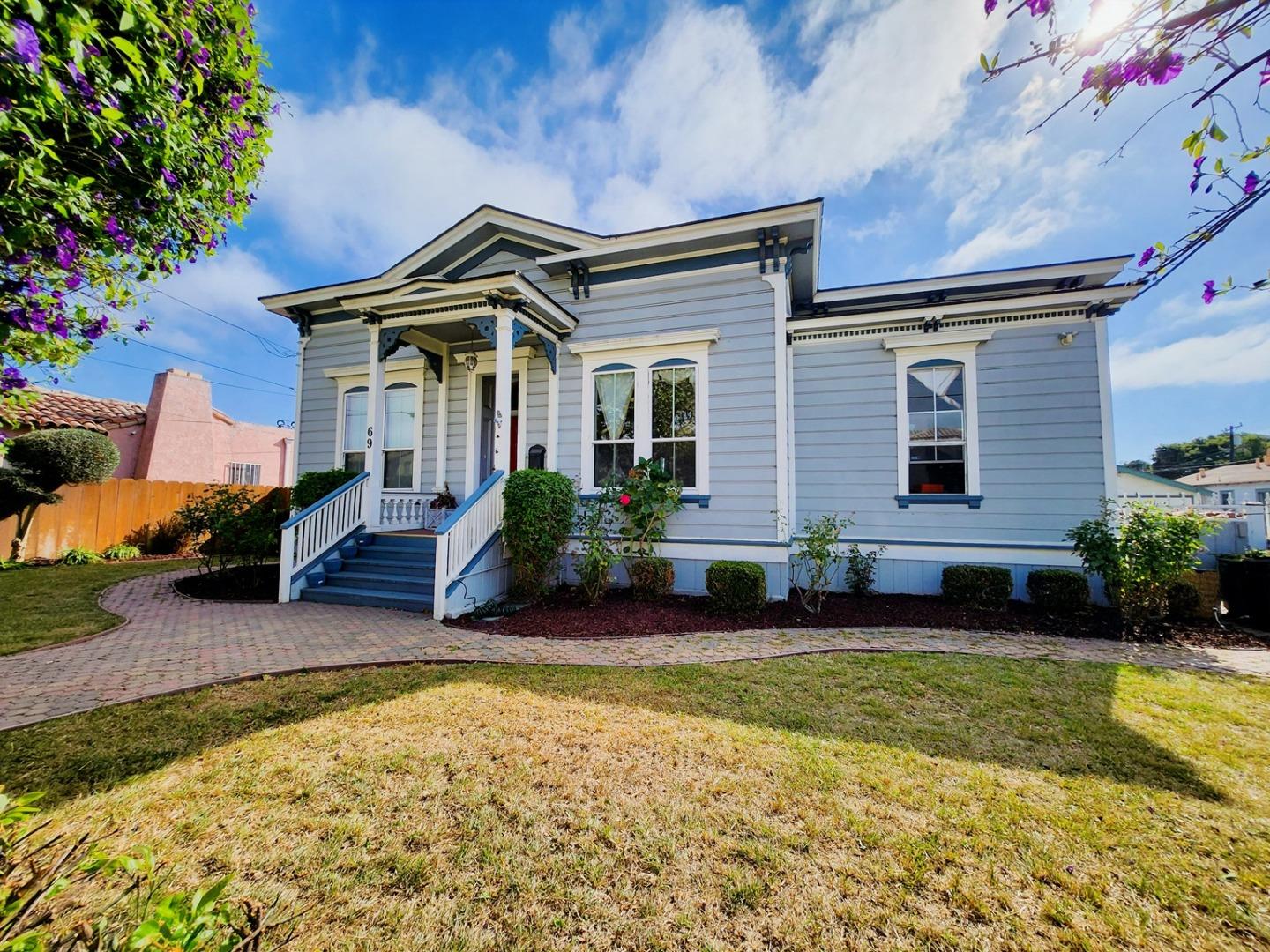 69 Geil Street Salinas, CA 93901 - Photo 1 of 34 a front view of a house with a yard