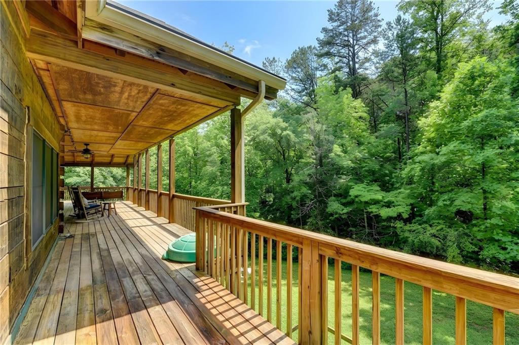 82 Walnut Grove Lane Tiger, GA 30576 - Photo 72 of 88 a view of balcony with wooden floor and outdoor seating