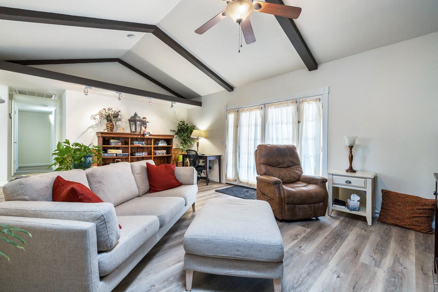 2877 Caesar Avenue Clovis, CA 93612 - Photo 7 of 32 a living room with furniture and a large window