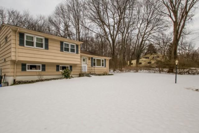 50 Arbor Road Monroe, CT 06468 - Photo 1 of 1 a front view of a house with a yard