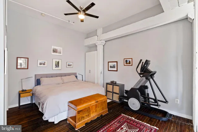 a bed room with a bed and a window