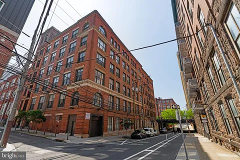 a view of a building and a street