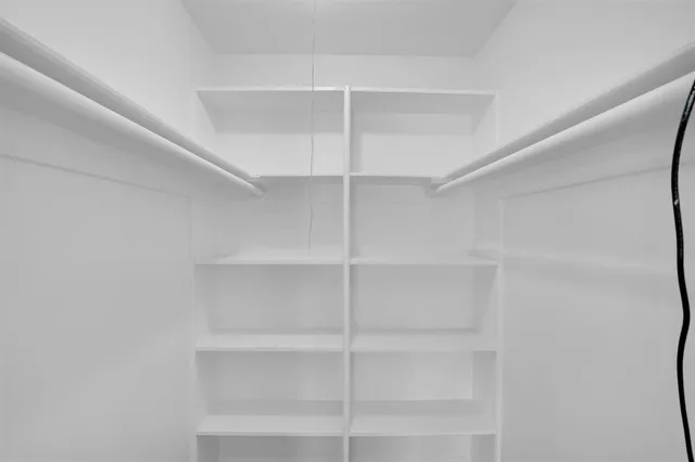 a view of a room with shelves