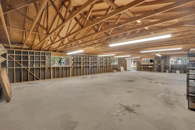 a view of a garage with wooden floor
