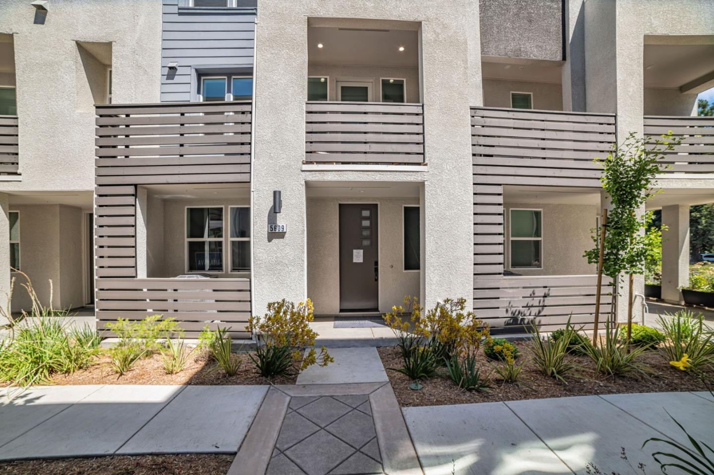 3106 Seashell Terrace San Ramon, CA 94583 - Photo 1 of 1 a view of a brick house with potted plants