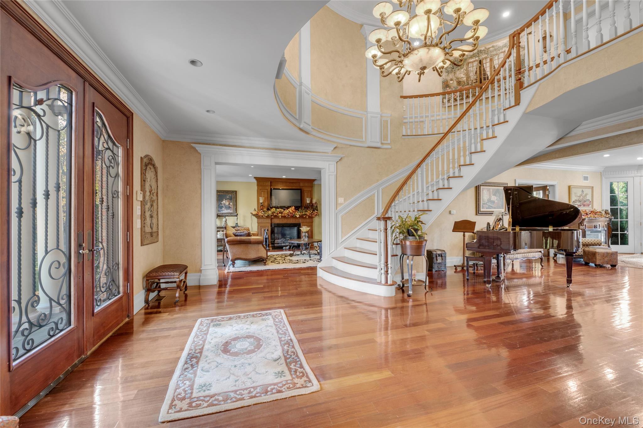 109 Wheatley Road Glen Head, NY 11545 - Photo 14 of 47 a view of entryway and hall with wooden floor