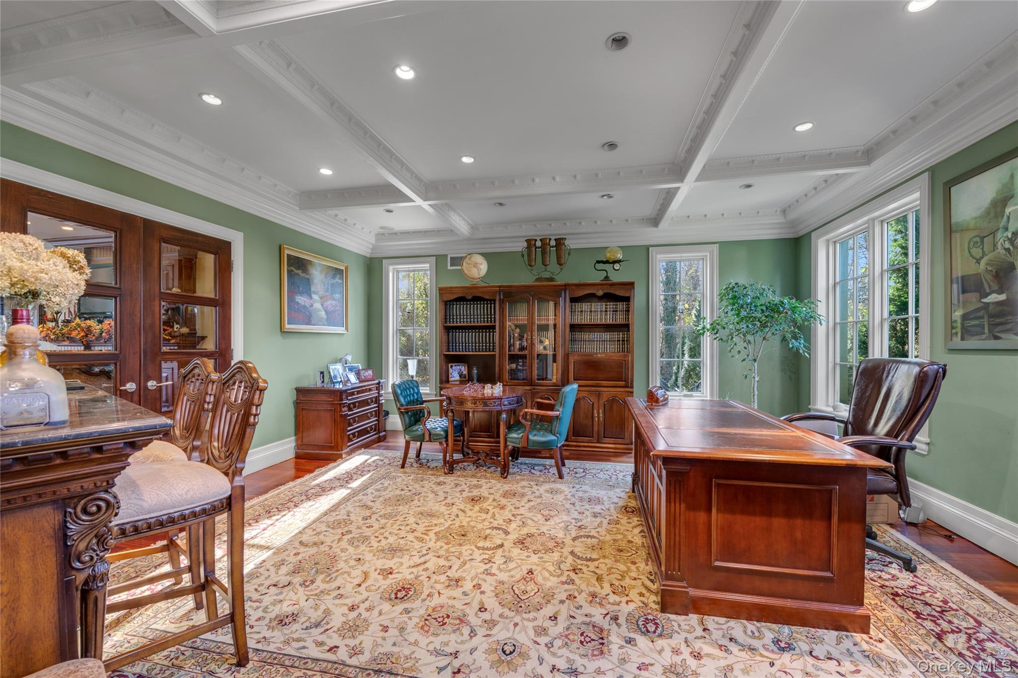 109 Wheatley Road Glen Head, NY 11545 - Photo 19 of 47 a living room with furniture a rug and a floor to ceiling window