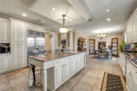 a kitchen with sink cabinets and counter space
