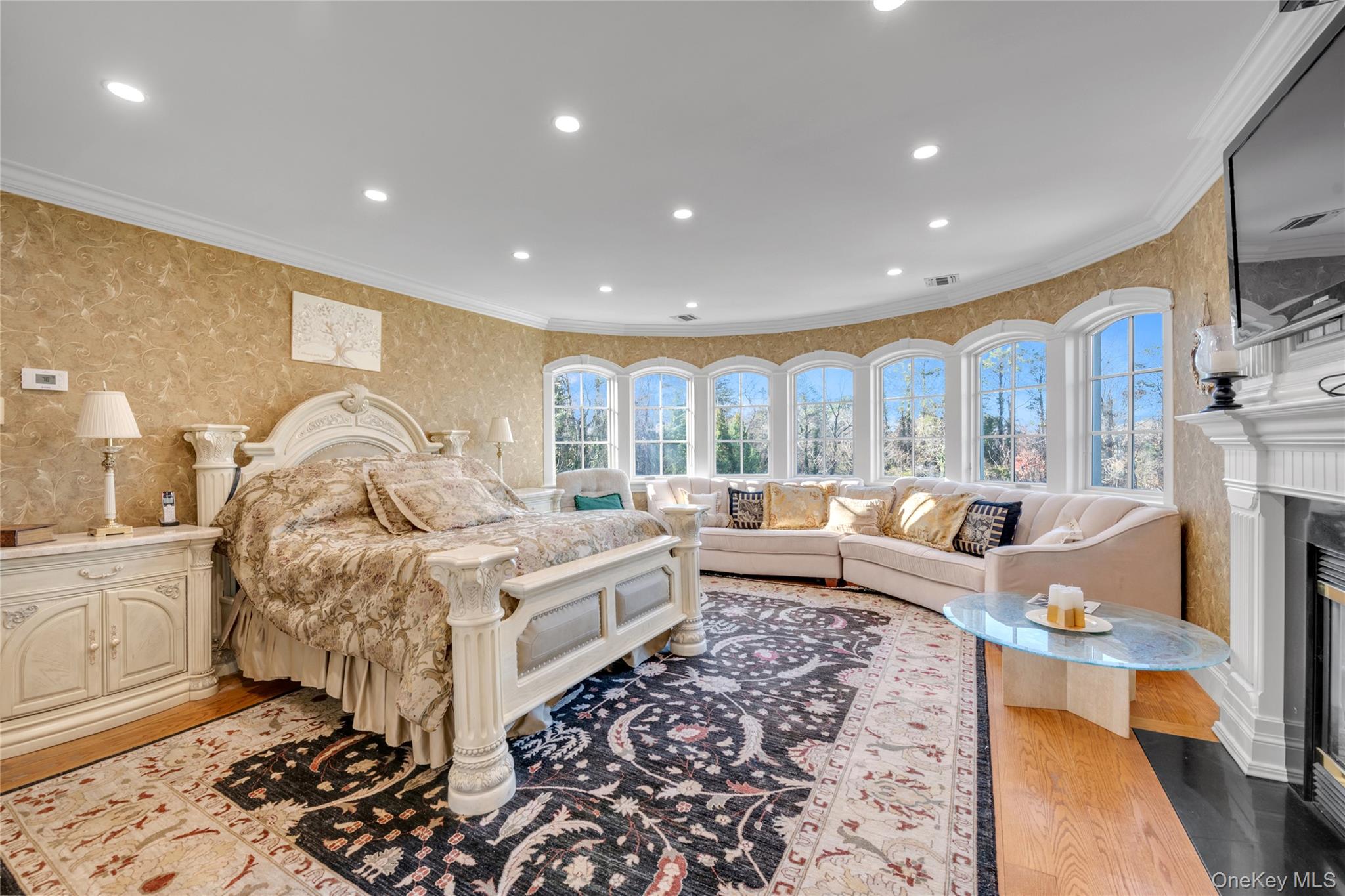 109 Wheatley Road Glen Head, NY 11545 - Photo 33 of 47 a bed room with a bed and a couch