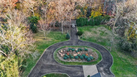 a view of a chairs setting on the roof deck