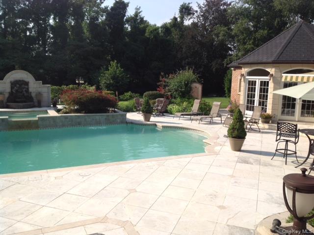 109 Wheatley Road Glen Head, NY 11545 - Photo 46 of 47 a view of outdoor space yard deck and swimming pool