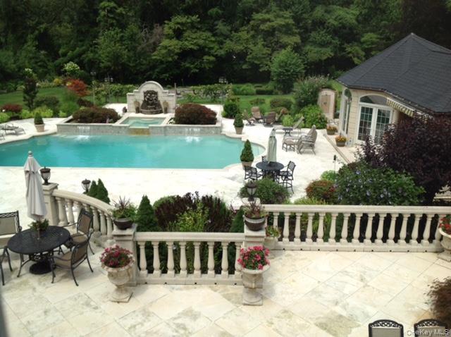 109 Wheatley Road Glen Head, NY 11545 - Photo 5 of 47 a view of a house with backyard and sitting area