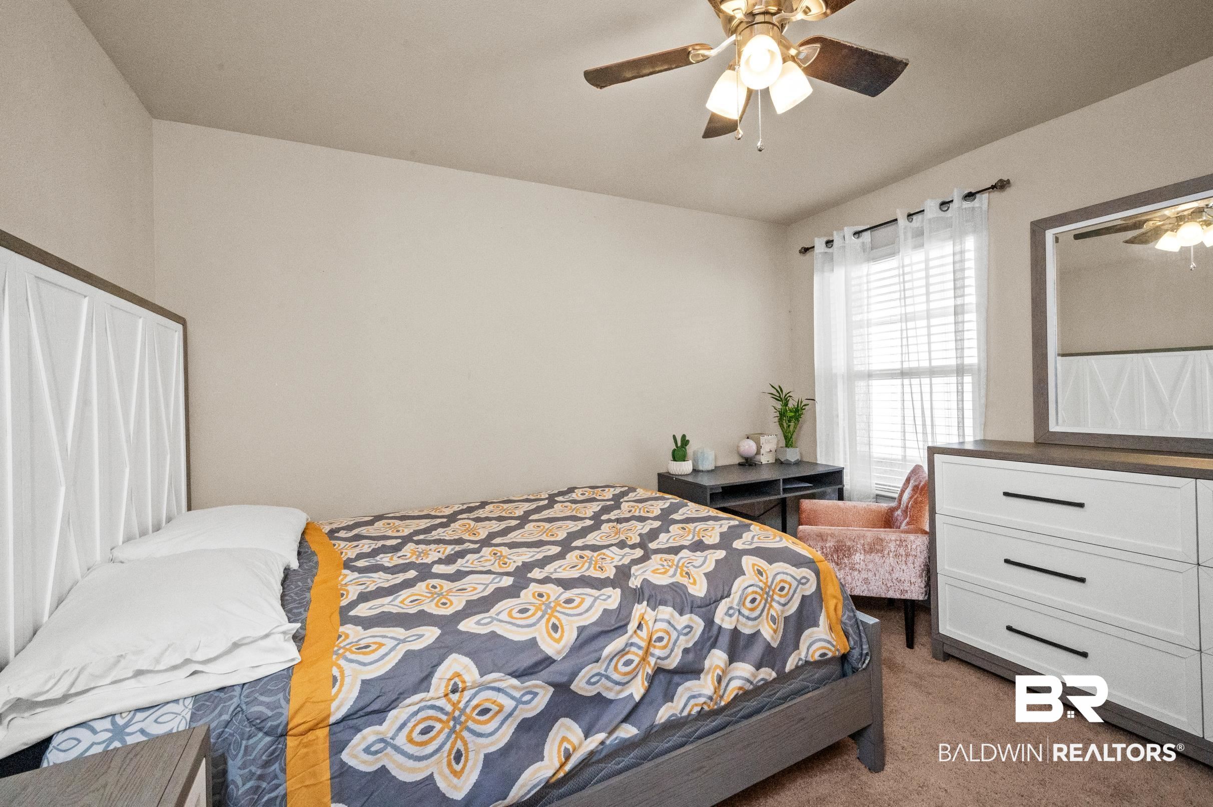 17449 Harding Drive Foley, AL 36535 - Photo 19 of 52 Carpeted bedroom featuring ceiling fan