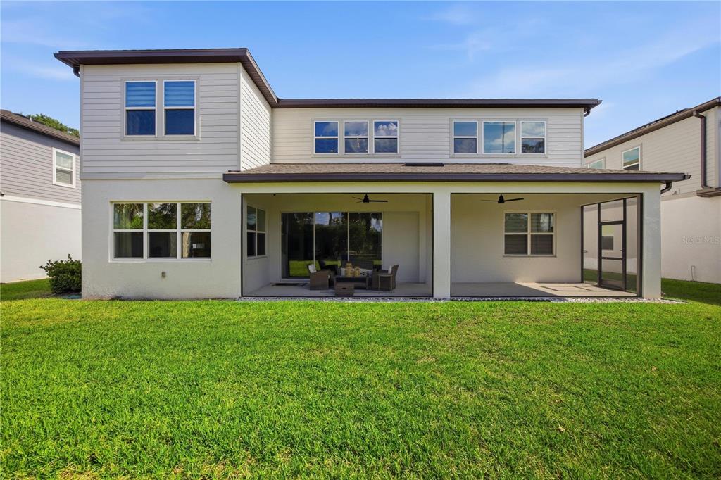 13816 Sharp Hawk Drive Riverview, FL 33569 - Photo 64 of 76 a view of a house with a yard and sitting area