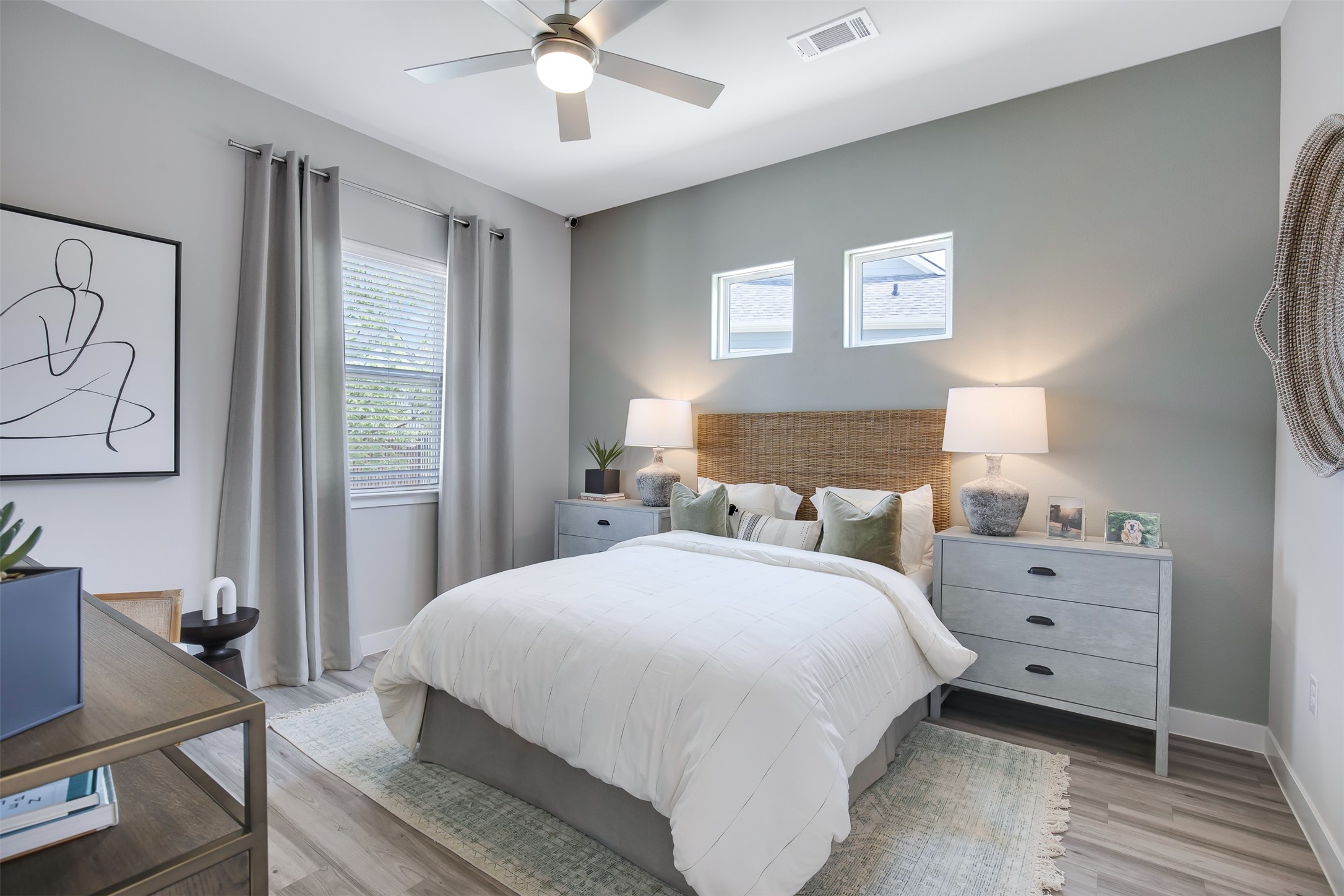 7142 Rustle Road Fort Worth, TX 76123 - Photo 18 of 38 a bedroom with a bed and a chandelier
