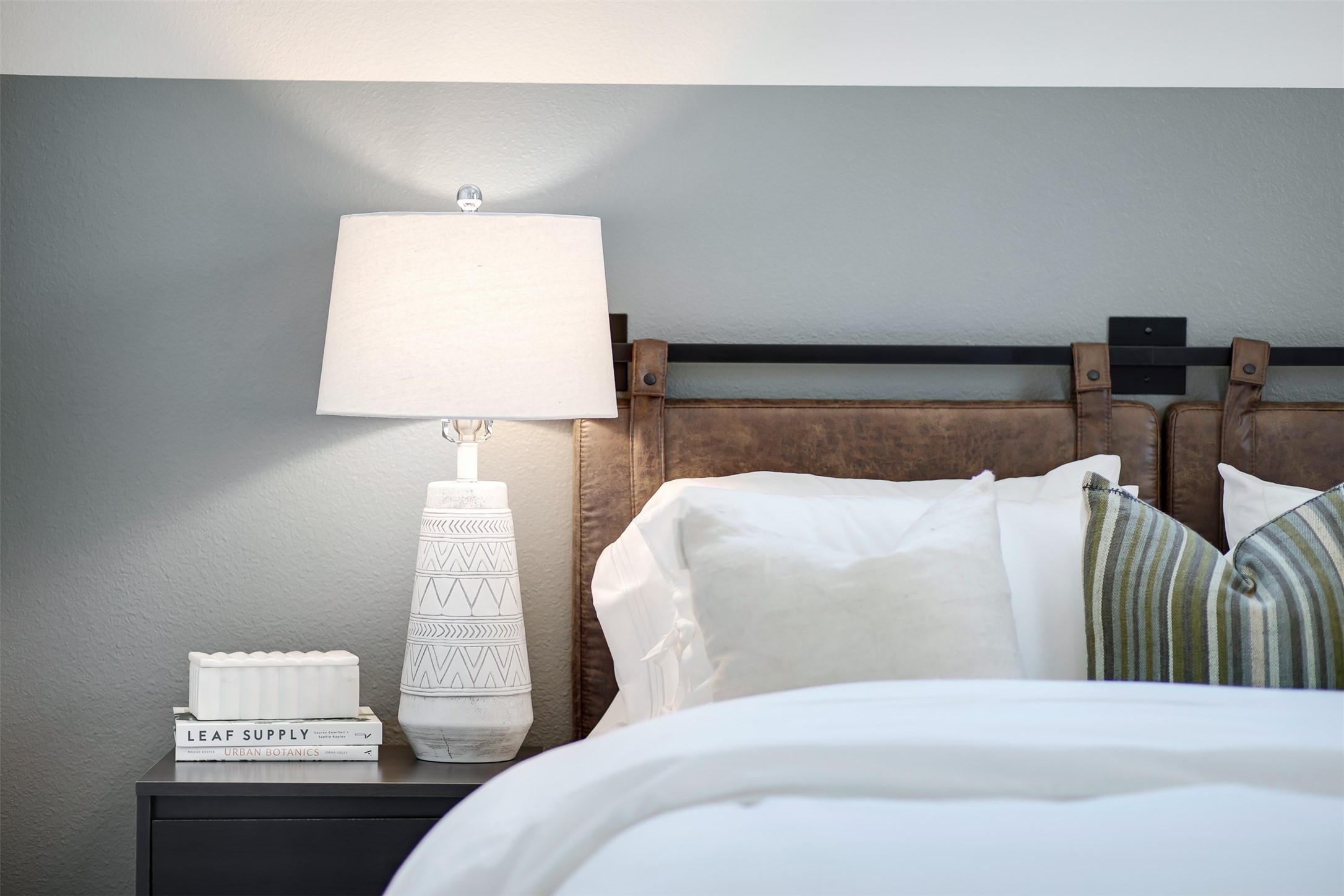 7142 Rustle Road Fort Worth, TX 76123 - Photo 25 of 38 a bed sitting in a bedroom and lamp