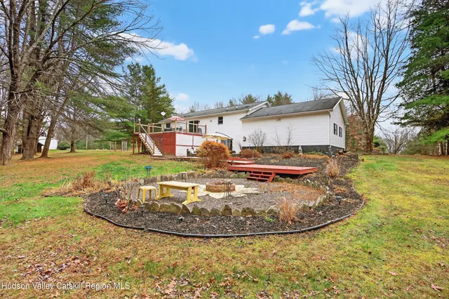 a view of a water fountain in front of a house