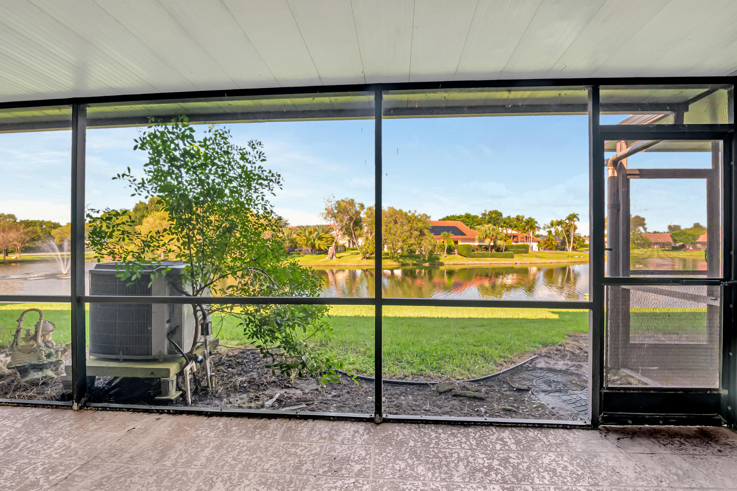 10321 Hidden Springs Court Boca Raton, FL 33498 - Photo 18 of 34 Screened Patio
