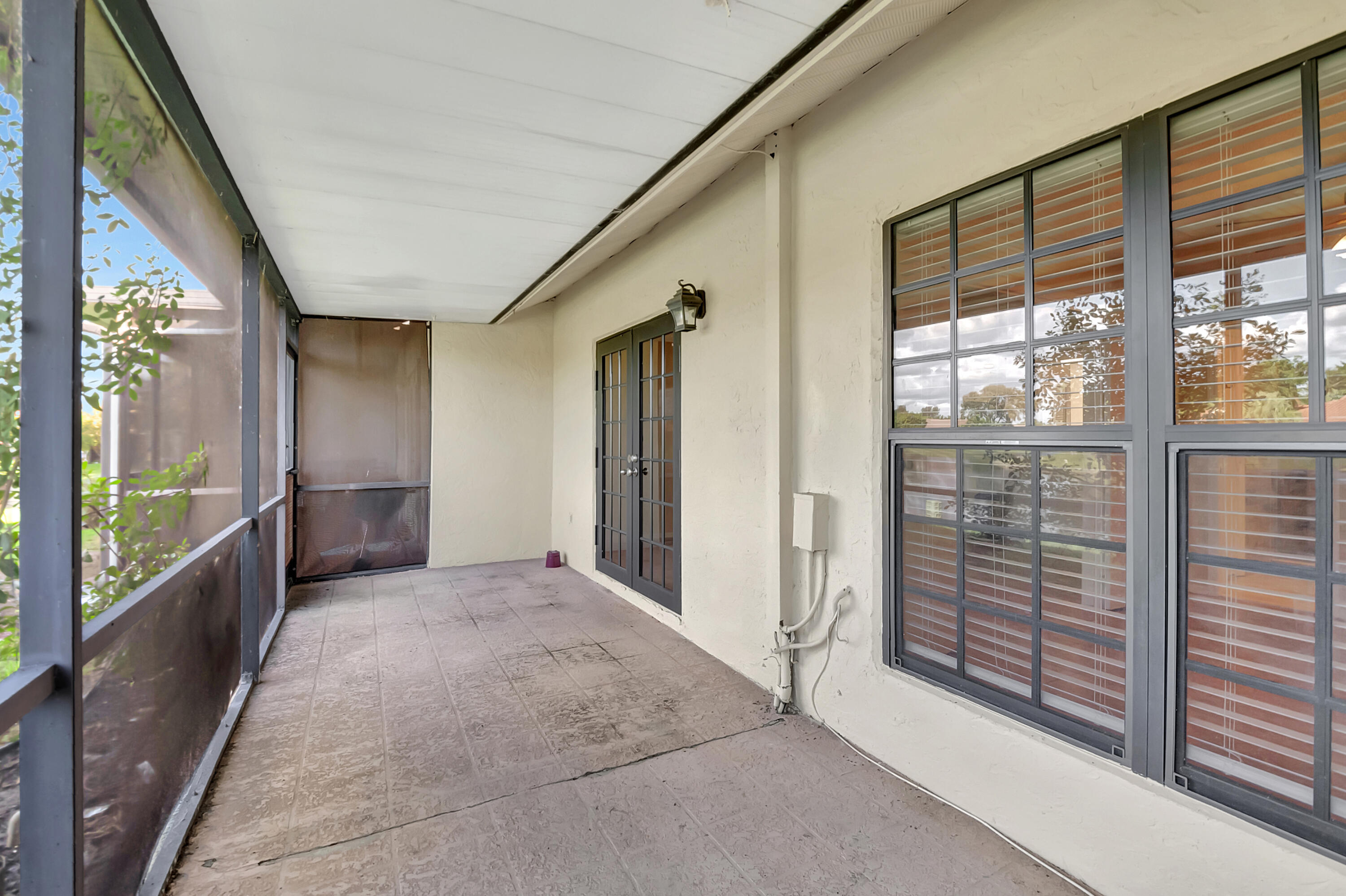 10321 Hidden Springs Court Boca Raton, FL 33498 - Photo 20 of 34 Screened Patio