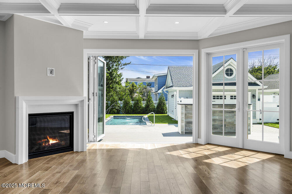 11 Union Avenue Spring Lake, NJ 07762 - Photo 19 of 109 a view of an empty room with a fireplace and a window