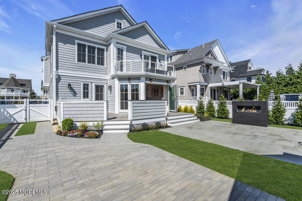 11 Union Avenue Spring Lake, NJ 07762 - Photo 2 of 109 a front view of a house with a yard