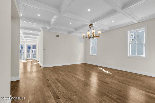 11 Union Avenue Spring Lake, NJ 07762 - Photo 28 of 109 a view of an empty room with wooden floor and a window