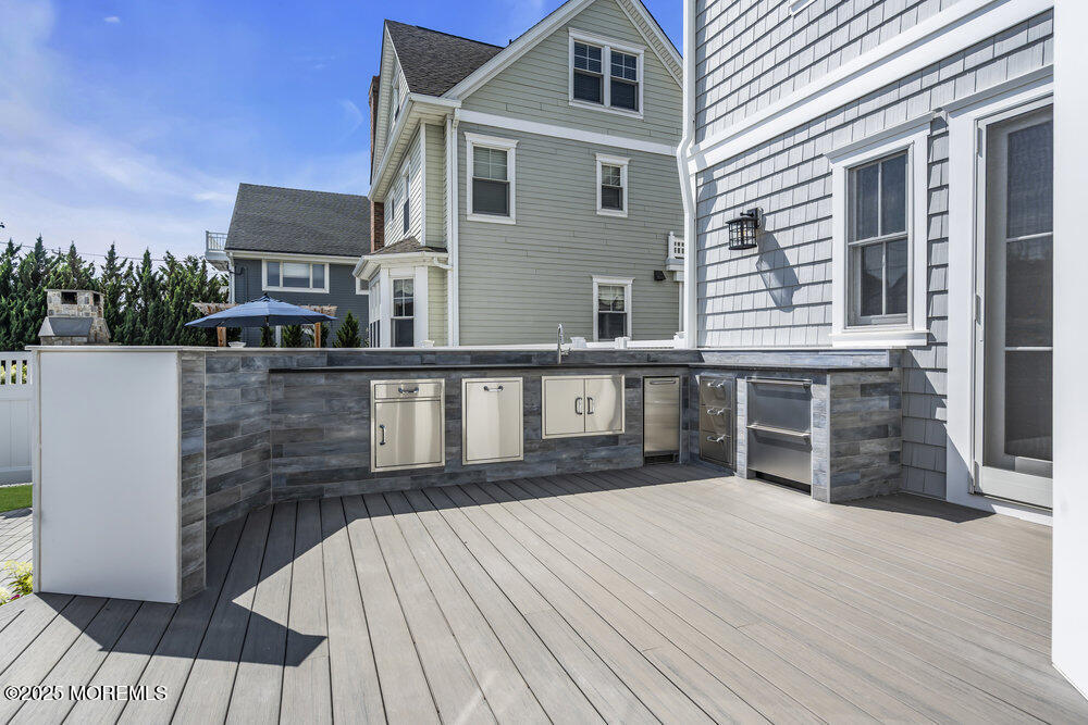 11 Union Avenue Spring Lake, NJ 07762 - Photo 4 of 109 a front view of a house with a yard