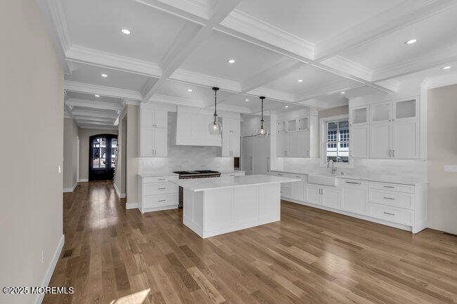 11 Union Avenue Spring Lake, NJ 07762 - Photo 42 of 109 a large kitchen with stainless steel appliances a large counter top a stove a sink and a refrigerator