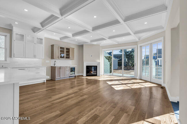11 Union Avenue Spring Lake, NJ 07762 - Photo 43 of 109 a view of an empty room with wooden floor and a window