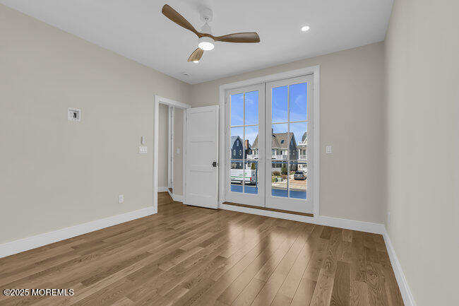 11 Union Avenue Spring Lake, NJ 07762 - Photo 46 of 109 an empty room with wooden floor and window